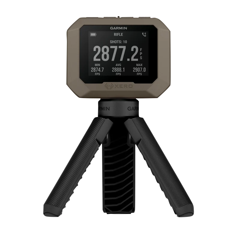 Garmin Xero C1 Pro chronograph for firearm and archery use on a tripod, tan housing with Garmin logo