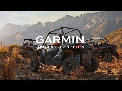 Garmin Tread Powersport GPS logo over rugged side-by-side UTVs in desert terrain
