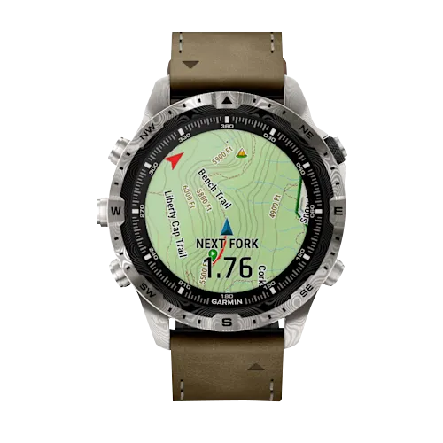 Garmin MARQ Adventurer Damascus Steel Edition smart watch with brown leather strap