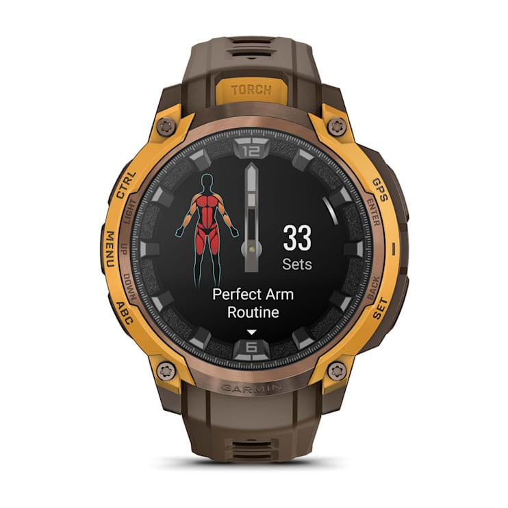 Garmin Instinct Crossover AMOLED smartwatch with gold bezel and brown strap, showing workout screen.