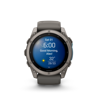Garmin Fenix 9 AMOLED smartwatch, 51mm titanium case with gray silicone band, front view.